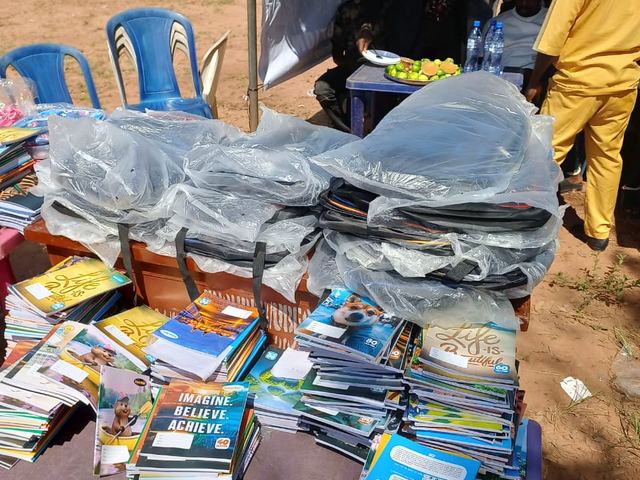 School supplies set out on the desks.