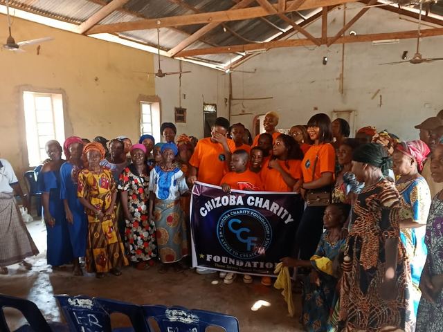 The team with the women of the community after the gifts were shared.