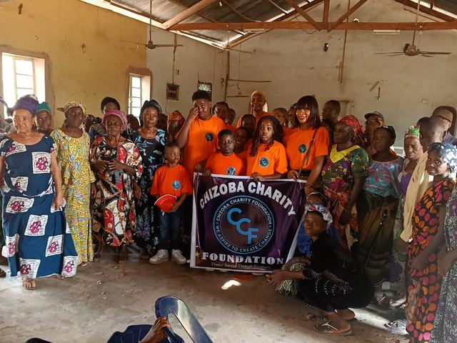 Volunteers in Foundation colours alongside the guests of honour.