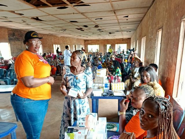 Volunteers lay out the free medications ready for dispensing.